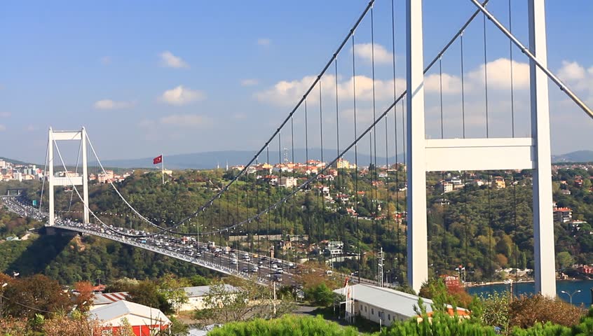 FSM (Second) Bridge, Istanbul, Turkey. Heavy traffic on the cable bridge. Tilt
