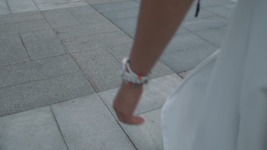 Anonymous woman on longboard