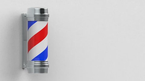a rotating barber shop pole motion on white cement wall background footage.