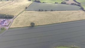 Aerial footage over Welsh farm land in Hawarden North Wales.