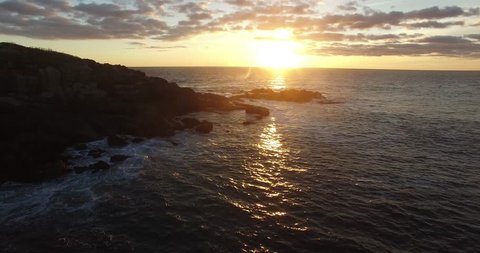 Sunrise with Waves Breaking Gently on Rocky Coast - Footage of the Shores at Cape Neddick Lighthouse, Maine, USA