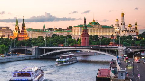 Time lapse view of Moscow Kremlin and Moskva River at sunset in Moscow, Russia. Zoom out.