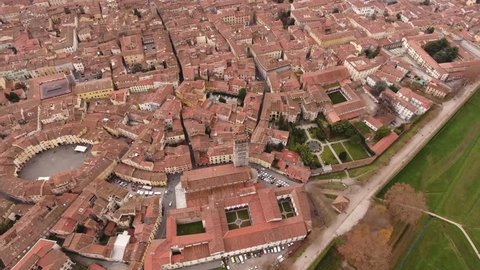 Aerial shot, beautiful panorama of Lucca city, an ancient town in the middle of Tuscany, Italy,  4K
