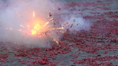 Slow motion Procession Taiwanese with traditional red firecrackers explode front temple of township in Taiwan festivals. Celebration Matsu God in the street of Taipei city-Dan