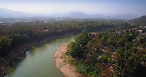 Historic Luang Prabang on the Mekong River in Laos, Ascending Drone Shot