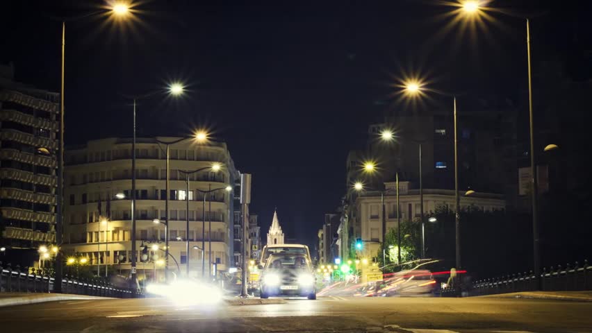 LEON, SPAIN - CIRCA 2012: Time lapse of a busy intersection at night circa 2012