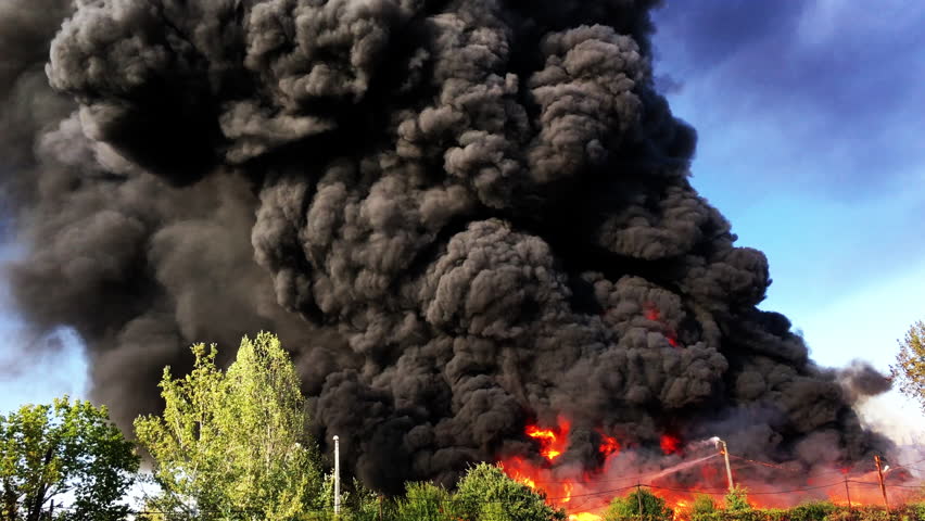 Warehouse engulfed in raging fire with huge column of smoke | Shutterstock HD Video #29518564