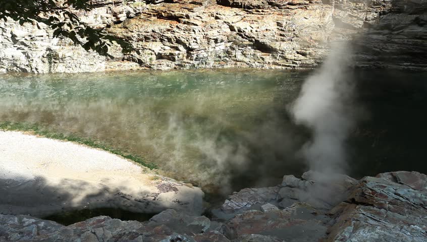 Steam over Minase river from geyser at Oyasukyo Valley in Yuzawa city, Japan