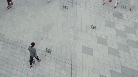 Seoul - July 2017: People walking in in front of Dongdaemun Design Plaza. Elevated view. 4K resolution 