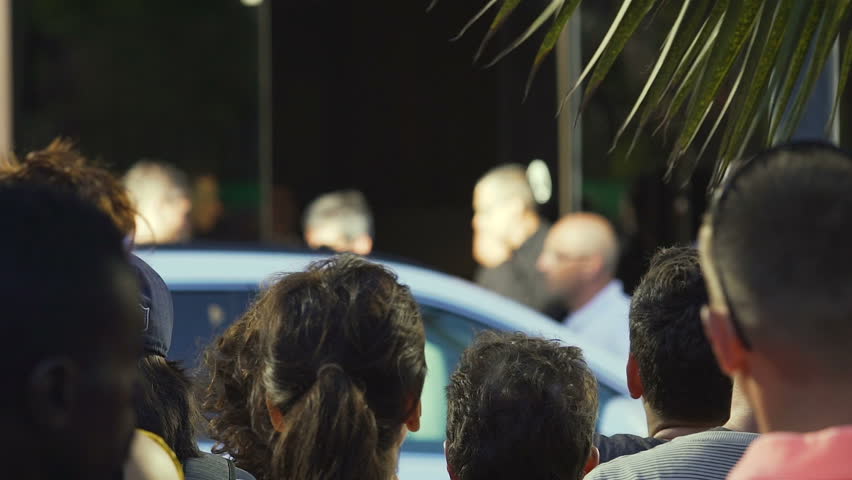 Crowd of annoyed protesters blocking road with demands to government, rally