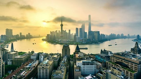 4k (4096x2304) time-lapse: Shanghai skyline at sunrise.Aerial view of high-rise buildings with Huangpu River in Shanghai, China.- Original Size 8k. - >>> Please search similar: " ShanghaiSkyline " . 