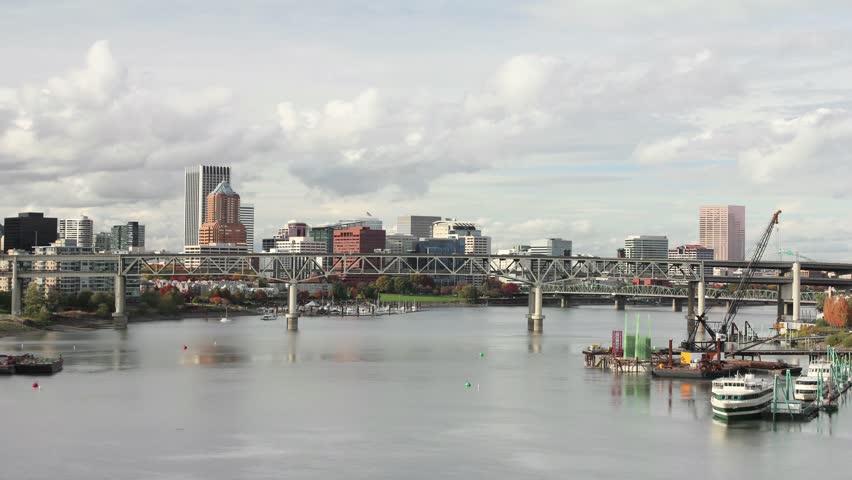 Portland Oregon Downtown Skyline with Marquam and Hawthorne Bridges across Willamette River Timelapse from Ross Island  1920x1080