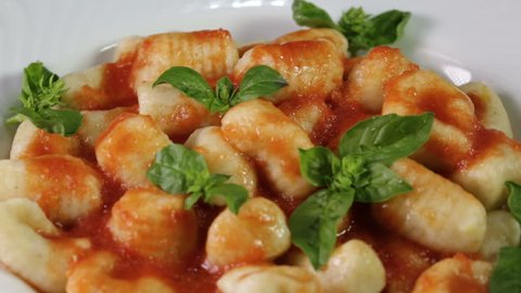 Italian food potato gnocchi in a white dish for a restaurant