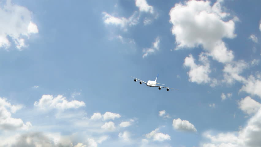 An Airbus 380 flying at cruising altitude banking towards the viewer.  (High