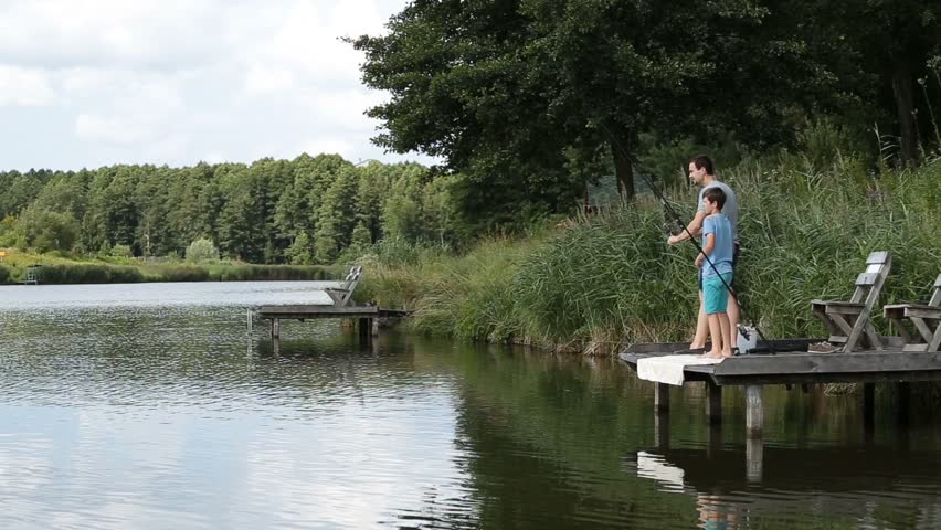 Father with his son and Fishing Rods.