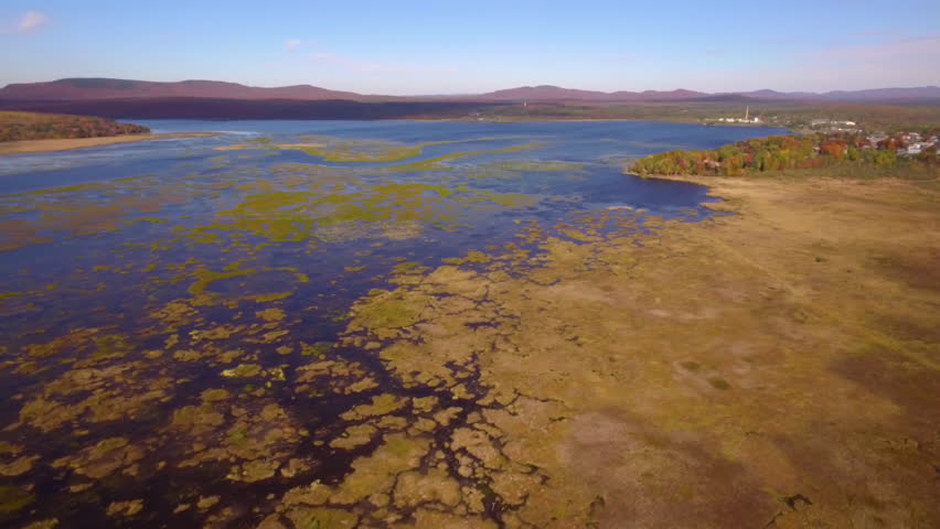 Panning aerial shot of Lake in the Adirondacks.