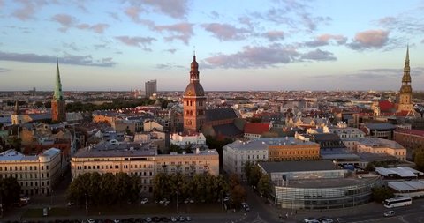 Beautiful Riga old town aerial view from above. Flying past Dome Cathedral.