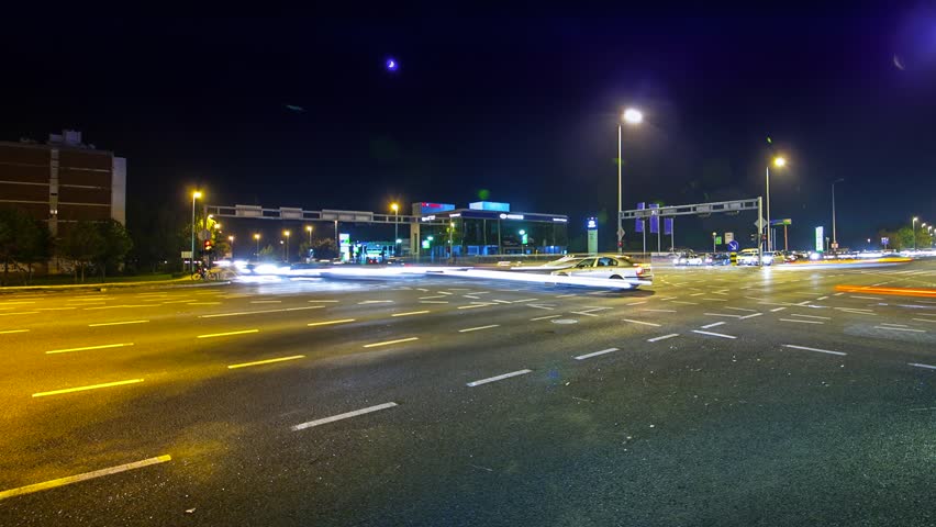 Cars in city traffic time lapse