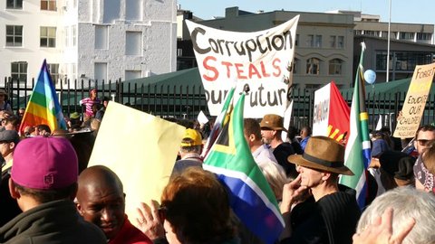 CAPE TOWN SOUTH AFRICA, 7 AUGUST 2017, Jacob Zuma no confidence vote march to parliament, Crowd head shots with placard "Corruption steals our future" 