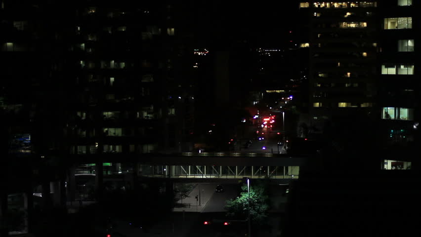 Urban Emergency vehicles at night in downtown Calgary from a high angle