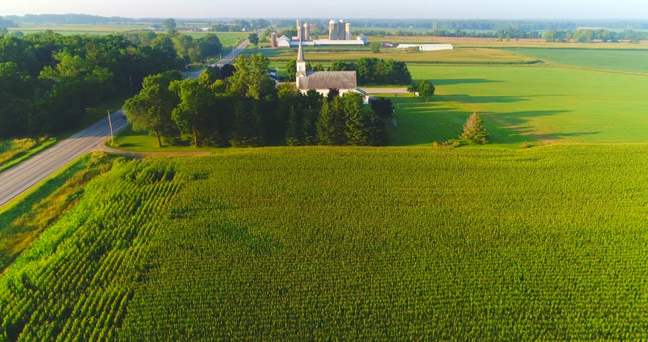 Exceptional beauty of rural Wisconsin Church, farms, aerial perspective.
