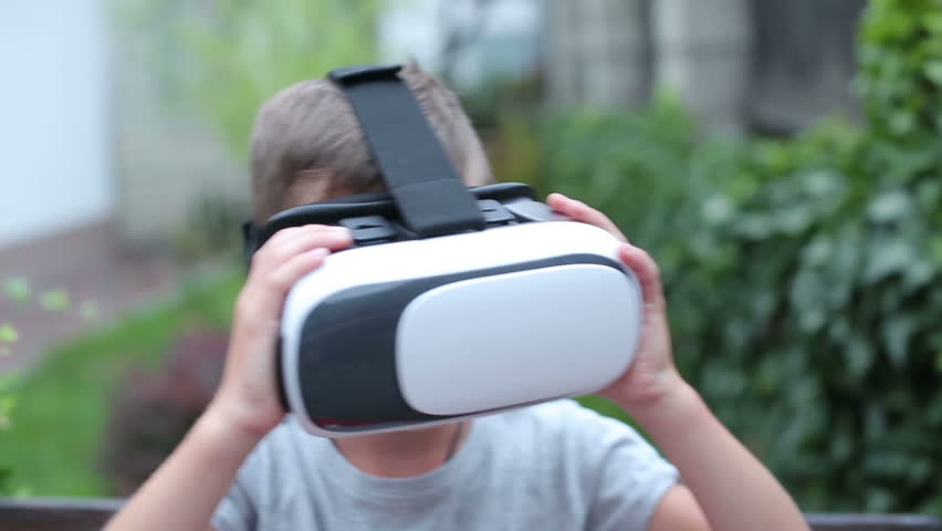 Child with VR Headset watching Royalty-Free Stock Footage #29599468