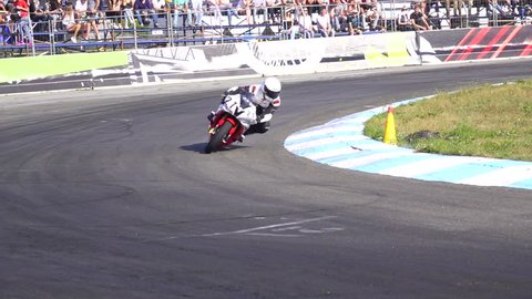 Kyiv (Kiev), 16 July 2017, Moto Open Fest. Motorcyclist on a sportbike turns on a track at high speed. Slow motion 