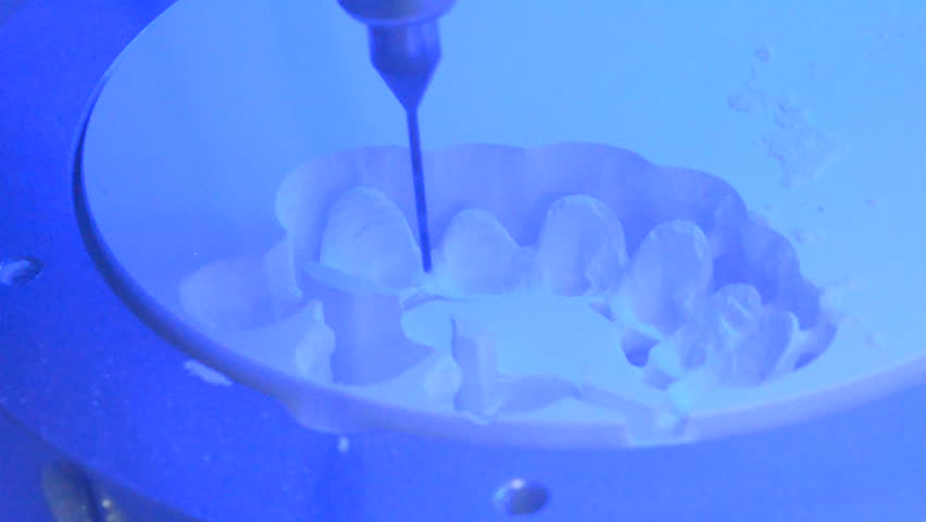 Dental milling machine carving out shape of human teeth close-up. Modern medical technologies. Concept of 4.0 industrial revolution Royalty-Free Stock Footage #29610259