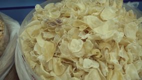 Dried salted seafood snack to beer in the supermarket stock footage video