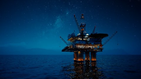 02876 View of an Oil rig at night. Milky way shines above.