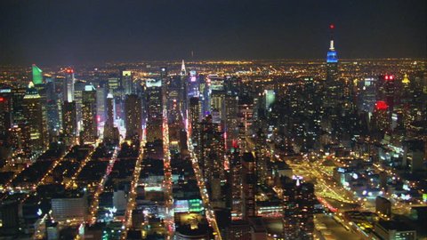 Aerial Shot of NYC Manhattan toward Chrysler Building at Night, New York, USA