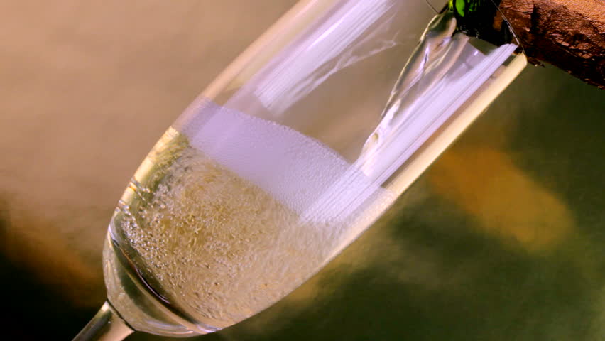 Close up of champagne being poured into flute