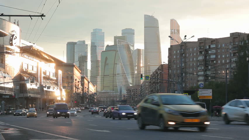 Cityscape at sunset with the skyscrapers of the Moscow International Business Center (also known as Moscow City) at background and traffic at foreground.