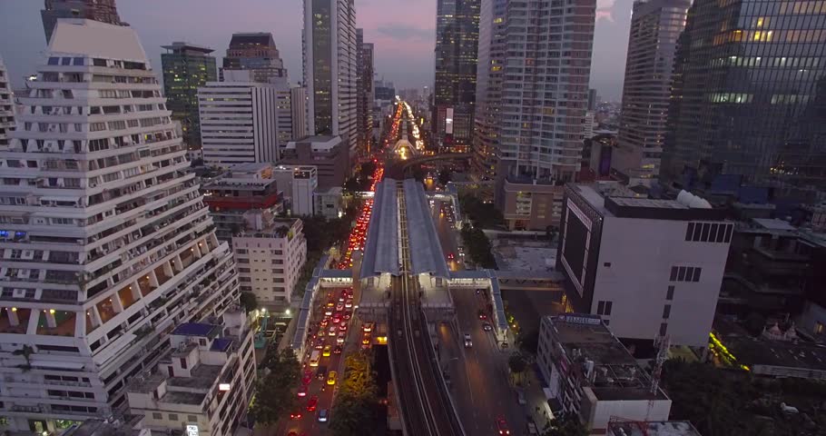 Busy Road and Skytrain in Central Bangkok at Dusk, Aerial Approach Shot | Shutterstock HD Video #29643175