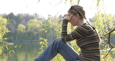 Depressed Woman Relax In Natural Place, Natural Park Lake And Sad Girl Suffer Alone