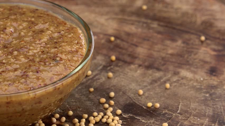 Fresh made Sweet Mustard (seamless loopable; 4K)