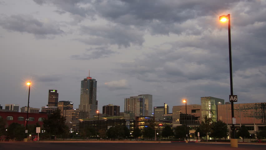 Downtown Denver, CO in time lapse as dusk turns to night.  This shot could be a