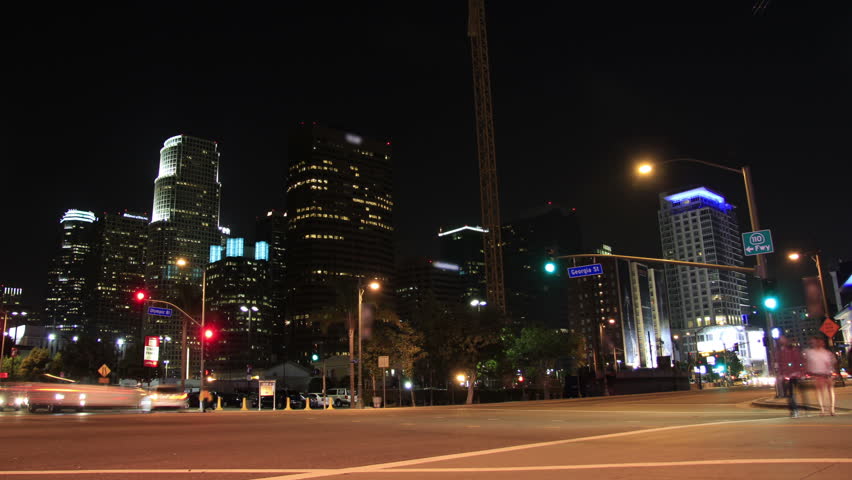 This is a time lapse shot of downtown Los Angeles at night over an intersection
