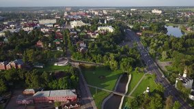 4K aerial view drone video of Sergiev Posad medieval Lavra complex of churches and cathedrals, walls, roads and area around it in small town 70 km east of Moscow, Russia on summer morning