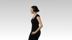 Woman dancing and listening to music