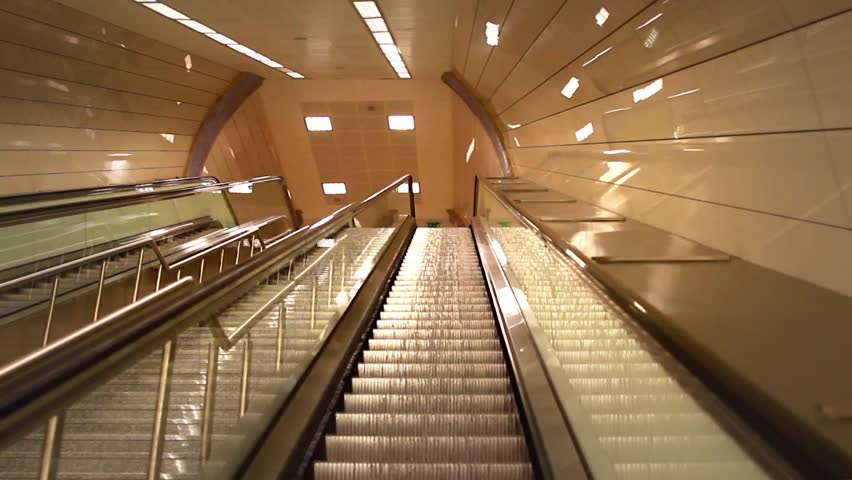 Perspective of escalator. Stair and escalators in a public area
