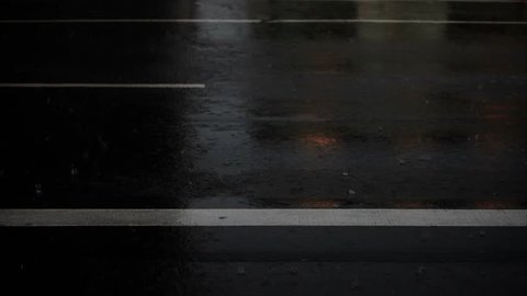 Cars drive on a heavy Rainy Day on the Road, in Full HD 1080p