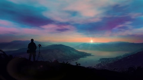 The Photographer Shoots A Fantastic Dawn In The Mountains : vidéo de stock