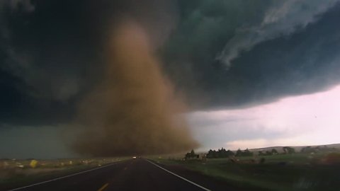 Wide Shot of a Tornado Over the Road - Wray, CO