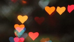 Heart shaped blurred lights. Valentine day, etc. topics.