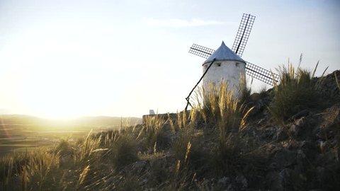 Close up of a windmill in Consuegra, Toledo, Spain. Sunny summer day, A wind. Locked down real time close up shot