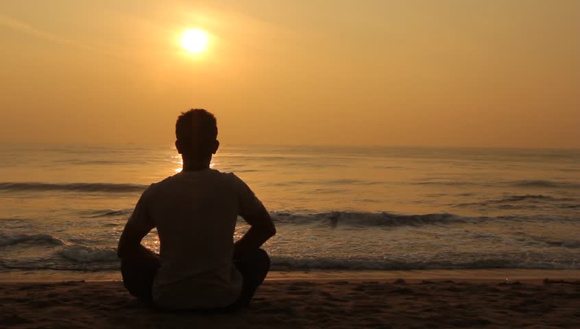 Man Meditating at Sunrise Stock Footage Video (100% Royalty-free ...