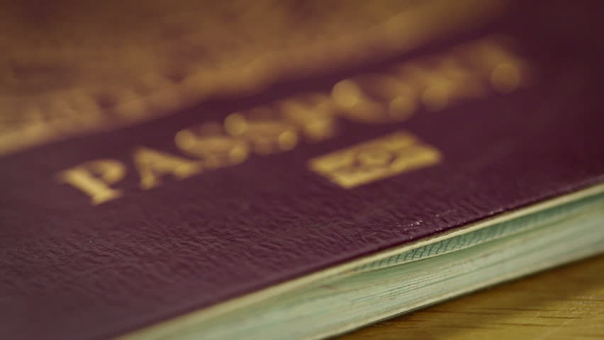 Flying over passport in extreme close up. Royalty-Free Stock Footage #29720830