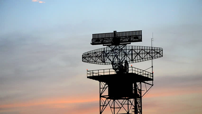 silhouette radar tower and plane
