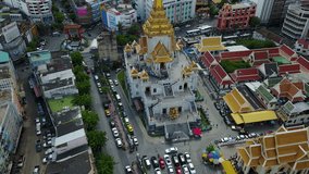 4K Aerial view of Wat Traimit Bangkok